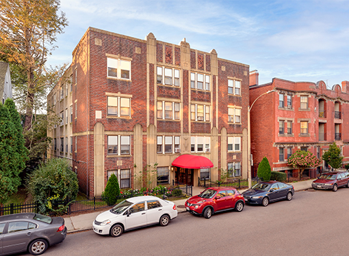 46 Englewood building from outside with cars parked along street